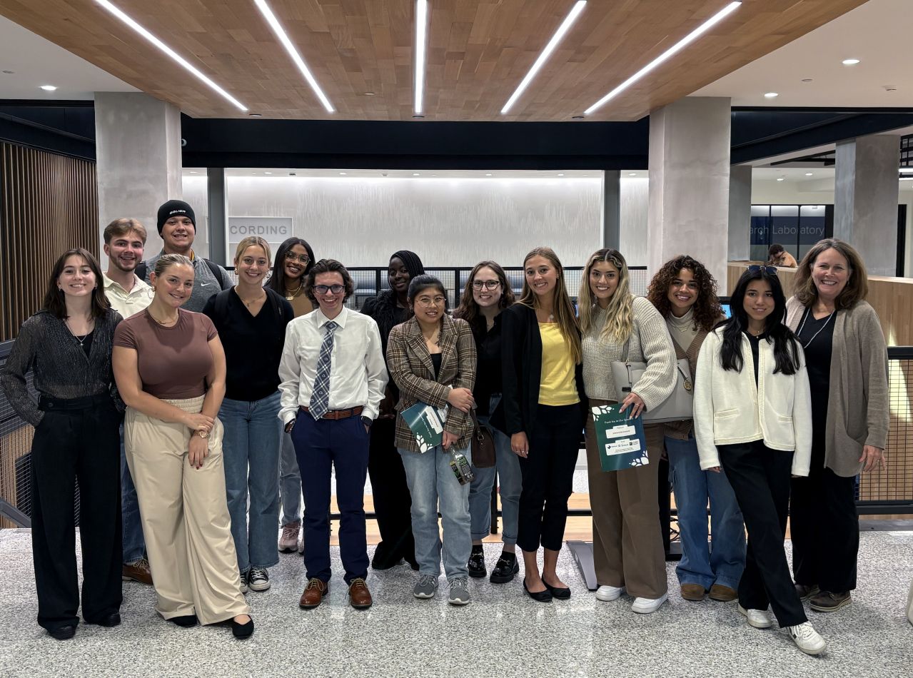 Seniors from Millersville University pose in the lobby of the Bellisario Media Center located on the University Park campus of Penn State.